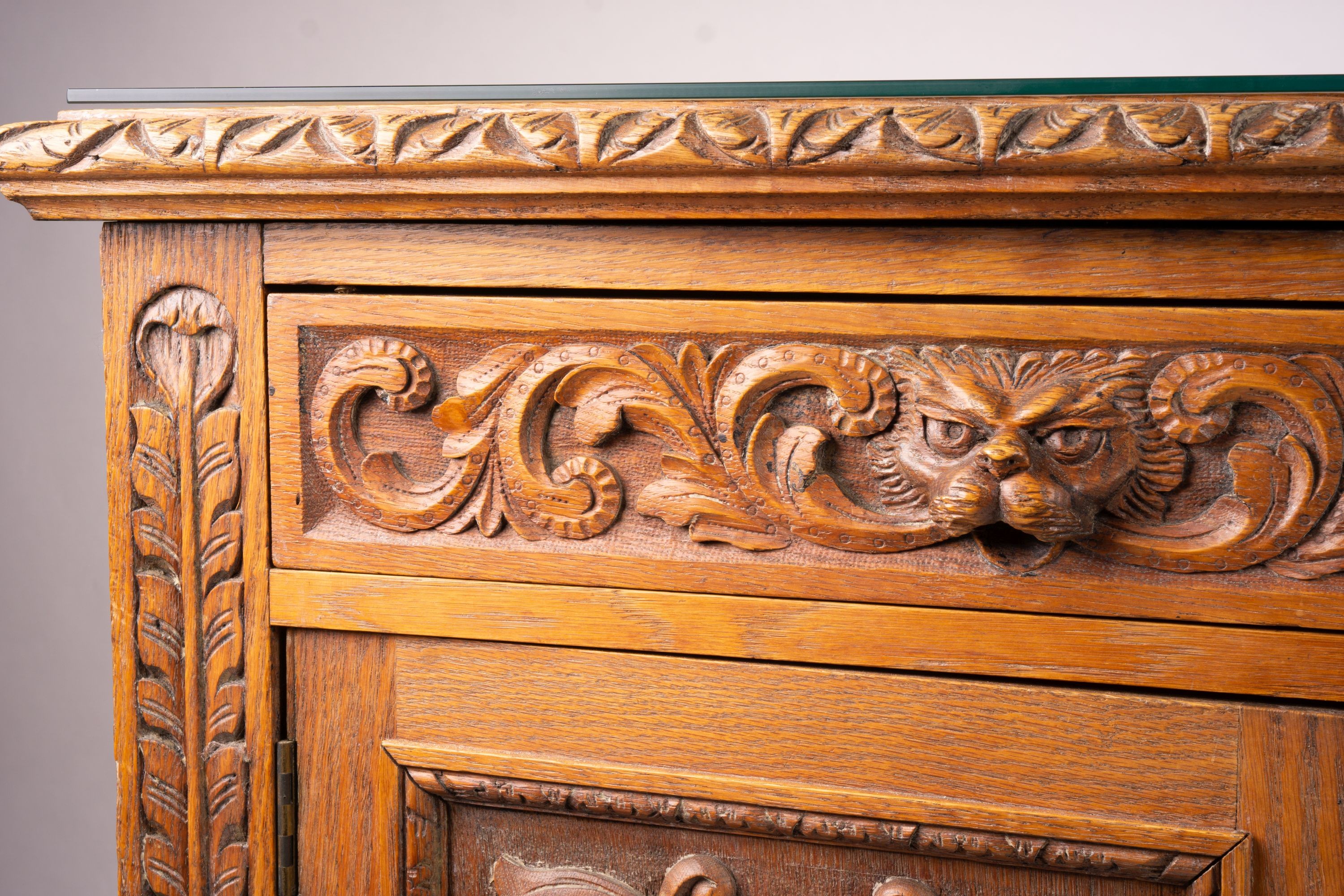 A late 19th century Flemish carved oak buffet, length 158cm, depth 58cm, height 99cm